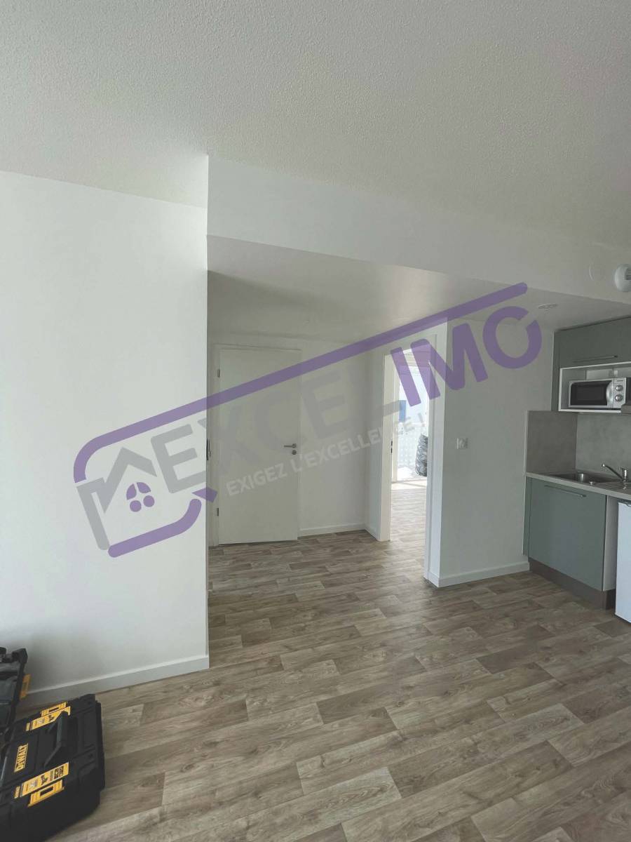 Appartement 3 pièces 50 m² à louer à Illkirch-Graffenstaden avec un séjour avec cuisine