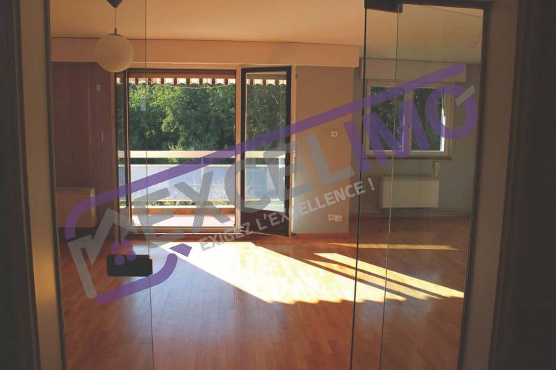 Appartement 4/5 pièces de 116m² à vendre au Neudorf dans le quartier Clos des Vanneaux avec un grand séjour / salle à manger de 32m²
