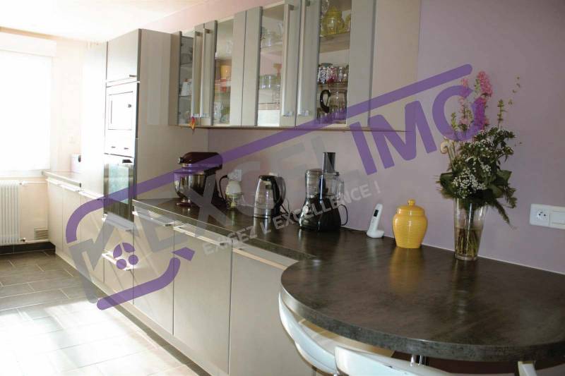 Appartement 5 pièces de 123.40m² à vendre à Strasbourg (67200) | Montagne Verte composé d'une cuisine équipée 